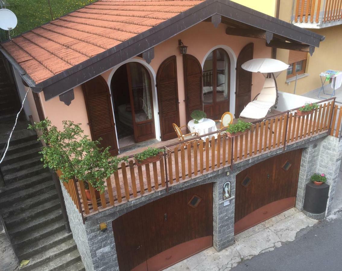 Chalet Con Piscina Garzeno Exterior photo