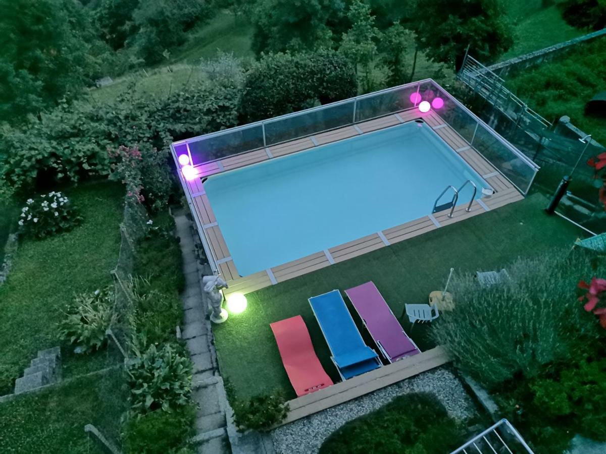 Chalet Con Piscina Garzeno Exterior photo